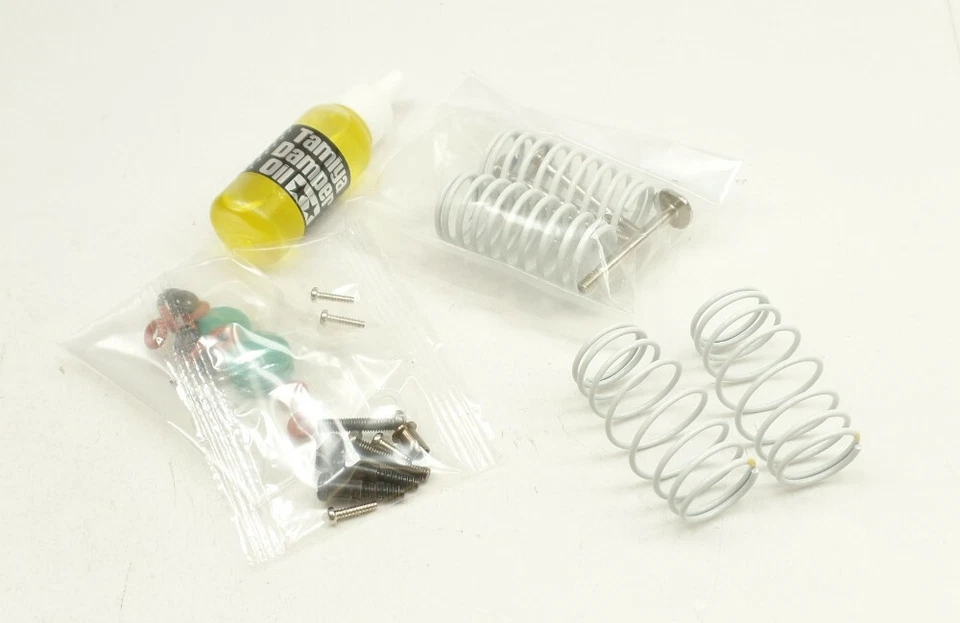 Tamiya 1:10 4WD CC-01 Landfreeder Black 19403399 Stoßdämpfer Beutel D TLC® - Bild 1 von 1