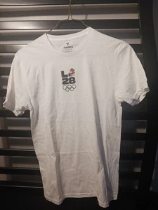 Men's White LA 2028 Summer Olympics Mascot Handover T-Shirt - Picture 1 of 4