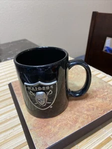 Taza Raiders emblema de peltre fino cerámica de 3,5" de alto - Imagen 1 de 4