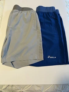Pantalones cortos de running Pudolla talla mediana. 2 pares talla mediana gris y azul buen estado - Imagen 1 de 6