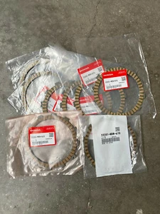 Honda CRF450R dischi frizione 21 22 23 24 clutch friction plates OEM originali - Foto 1 di 1