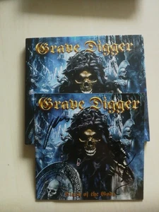 GRAVEDIGGER - CD "CLASH OF THE GODS" & ORIG. AUTOGRAMMEN - IN PERSON! - Bild 1 von 1