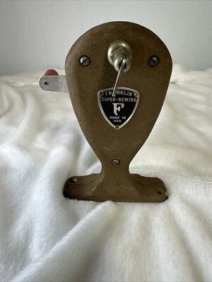 Rebobinadora de película Franklin Super-Rewind de colección de metal hecha en EE. UU. Marrón. Foto 1 de 4
