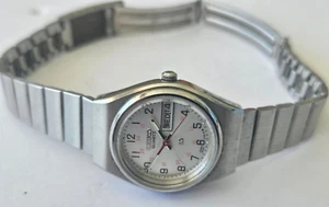 Seiko SQ #3423-0059 Silver Dial SS Day/Date 25mm Women Watch New Battery - Picture 1 of 5