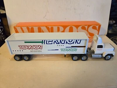 WINROSS 1:64 TEKNION OFFICE FURNITURE TRACTOR AND TRAILER  in orig. box - Image 1 of 4