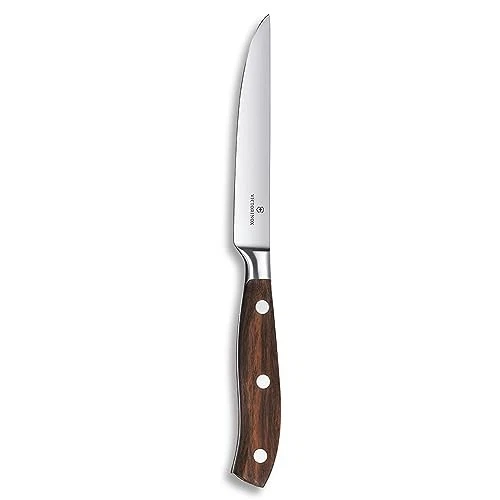 Cuchillo pequeño de madera forjada VICTORINOX 12 cm con borde ondulado para un corte fiable. Foto 1 de 3