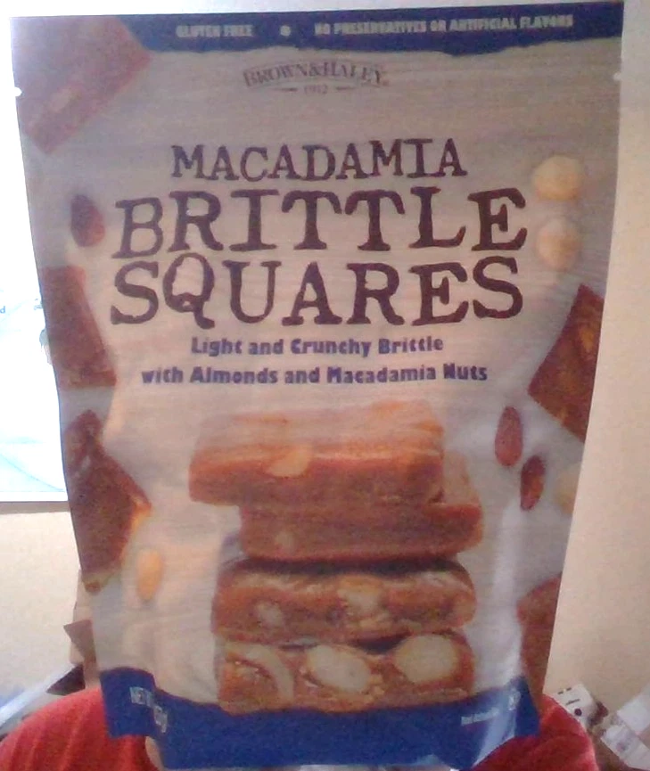 16 OZ Brown & Haley Macadamia Brittle Squares. Best By: 01/2027