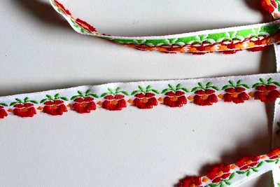 JACQUARD  RED  FLORAL DESIGN ON WHITE  BRAID  TRIM   3 YARDS X  1/2  INCHES WIDE - Image 1 of 2