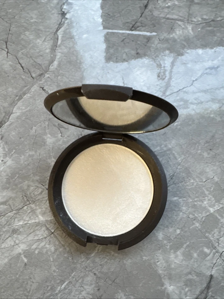 BECCA ~ POLVO PRENSADO PERFECCIONADOR PIEL BRILLANTE ~ PERLA ~ 0,25 OZ Foto 1 de 1