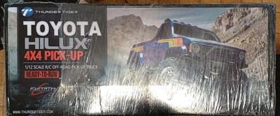 Thunder Tiger TOYOTA Hilux 1/12 PICK-UP Truck RTR Blue Black Red U.S Regulations - Image 1 of 2