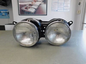 E28 528E 524TD 81-88 HEADLIGHT WITH BRACKET - LEFT - DRIVERS SIDE - Picture 1 of 9