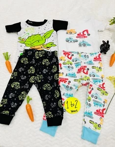 Boys pajama set for 1 to 2 yrs old. Good condition. Trucks and star wars design. - Picture 1 of 3