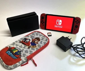 Nintendo Switch OLed Console | 64GB | con Gioco FIFA 19 e Cover Super Mario BROS - Imagen 1 de 23