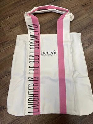 Bolso de Mano Benefit "La risa es el mejor cosmético" Rosa Blanco + Muestra de Imprimación de Poros Foto 1 de 4