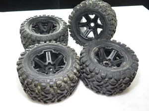 TRAXXAS REVO 3.3 NITRO (4) MOUNTED TIRES WHEELS - Picture 1 of 3