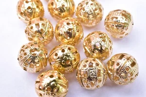 50 x 10mm Gold Plated Round Ball Filigree Spacer Beads Hollowed BEADS Charms - Picture 1 of 2