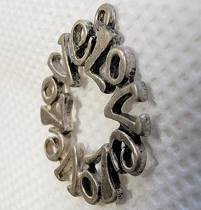 Vintage 1960s (maybe 1970s) Love Love Love made as a circle. 3/4" Pendant Silver - Picture 1 of 6