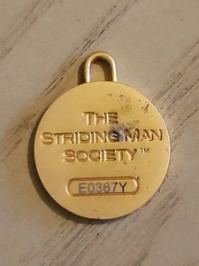 The STRIDINGMAN SOCIETY BADGE BY JOHNNY WALKER - Picture 1 of 2