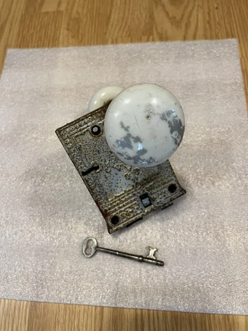 Antique Door Lock With White Porcelain Knobs And Skeleton Key Cover