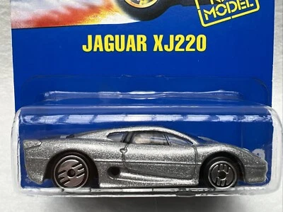 Tarjeta azul Hot Wheels JAGUAR XJ220 203 Malasia Ultra Hot Wheels pintura plateada Foto 1 de 4