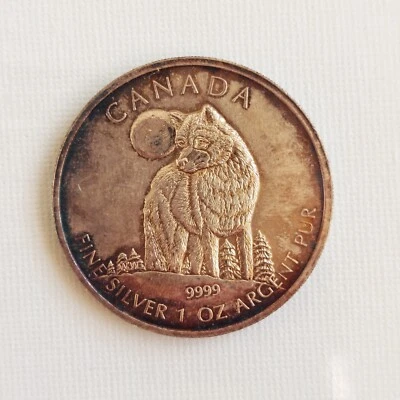 2011 Canada $5 1oz .9999 Silver BU Wolf Wildlife Series Coin Round- Toned - Image 1 of 2
