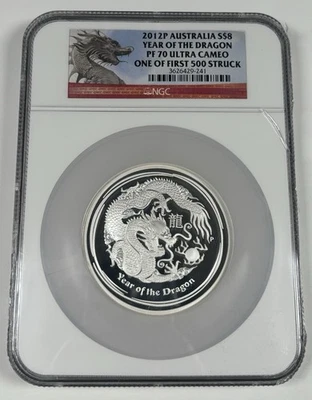 Australia 2012 8 USD Año del Dragón 5 OZ Plata NGC PR70 UCAM PRIMER 500 ACUÑADO Foto 1 de 2