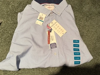 INTERNATIONAL REPORT SHORT SLEEVE 4 WAY STRETCH  XXL (NWT) RTL $68 - Image 1 of 4