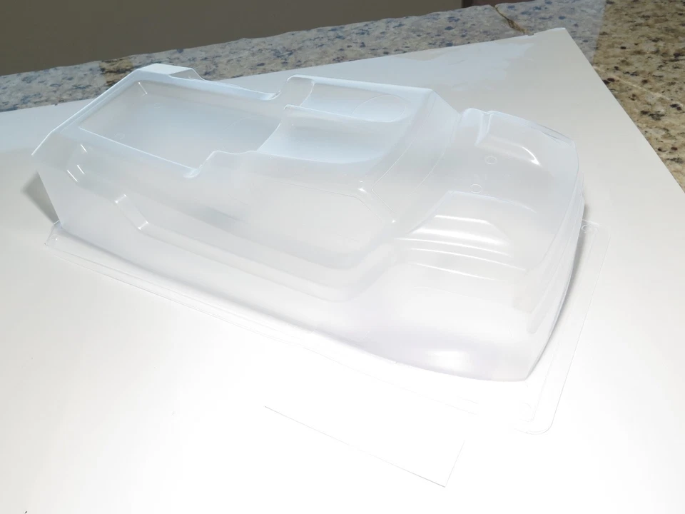  SER600064 SERPENT SRX8-T TRUGGY-E CLEAR BODY SHELL WITH WINDOW MASKING  - Image 1 of 1