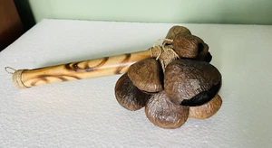 Natural Indonesian Pangi Seed Shaker - Bamboo Handle - Picture 1 of 6