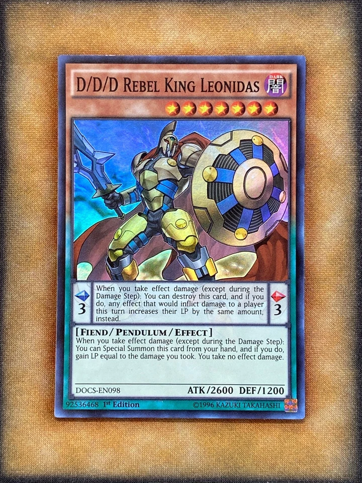 Yugioh D/D/D Rey Rebelde Leonidas DOCS-EN098 Súper Raro 1ª Edición Casi Nuevo Foto 1 de 1