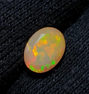 Natürlicher äthiopischer Opal Welo Feueropal ovale Form facettierter geschnittener Edelstein 0,75 crt - Bild 1 von 5