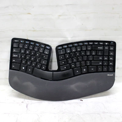 Teclado de escritorio ergonómico Microsoft Sculpt modelo 1559/falta dongle USB probado Foto 1 de 4