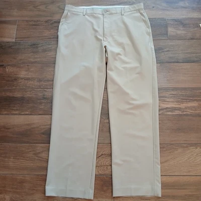 Pantalones de golf FootJoy para hombre 38x32 tostados rendimiento elásticos híbridos flexibles informales planos Foto 1 de 4