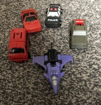 De colección G1 Transformers Micromasters Highjump, Stakeout, Roadhandler, Bolso de Mano Foto 1 de 3