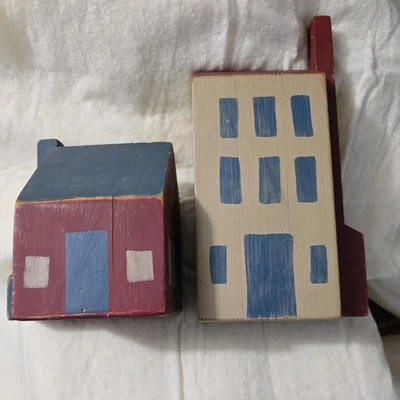 Folk Art Rustic Wooden Houses Hand Painted 2 pieces 7" & 11" tall - Image 1 of 4