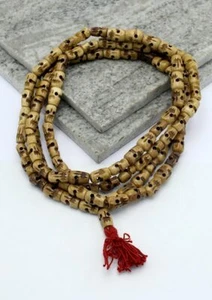 Calavera budista marrón claro oración Mala con borla roja - Imagen 1 de 3