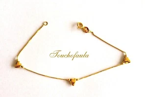 14K GELBGOLD DREI GEPUFFTE HERZEN MIT PERLEN ARMBAND HERGESTELLT IN ITALIEN. - Bild 1 von 2