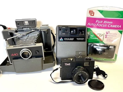 4 cameras 3 USED Polaroid 440, Kodamatic Champ, Time 35mm, New FUJI DISCOVERY 85 - Image 1 of 4