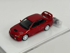 Motorhelix Mitsubishi Lancer Evolution IV 1/64 en rojo MIX2 - Imagen 1 de 8