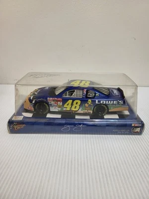 2002 Jimmie Johnson Lowes Looney Tunes Winners Circle Action NASCAR 1:24 Rookie - Image 1 of 2