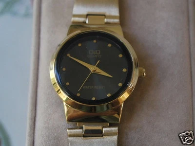 New Q&Q by Citizen Gold Tone Lady Dress Watch w/Black Dial - Image 1 of 4