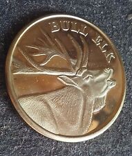Bull Elk bright brass card guard coin