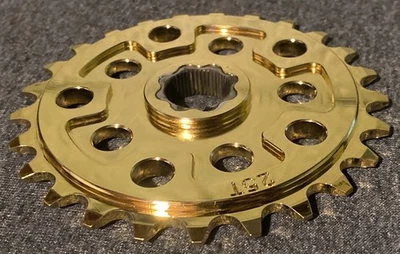 "Piñón Hutch BMX 25T oro 24K 19 mm 48 spline drive para cadena de 1/8""" Foto 1 de 4