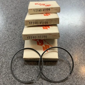 NUEVO OEM NUEVO ORIGINAL SUZUKI 1976 RM125 JUEGO DE ANILLOS DE PISTÓN 12140-41720 - Imagen 1 de 1