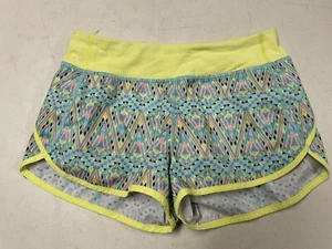 LULULEMON IVIVVA FUN COLORS ATHLETIC DANCE GYMNASTIC SHORTS GIRLS SZ 14 - Picture 1 of 3
