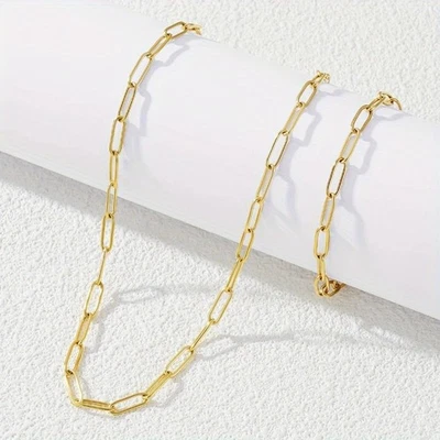 Conjunto de joyería de moda collar pulsera de acero titanio dorado para hombre y mujer Foto 1 de 4