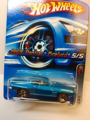 Pontiac Firebird 2006 Hot Wheels 1969 azul metálico #100 línea roja Foto 1 de 4