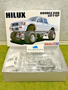 Aoshima No.5 Toyota LN107 Hilux Pickup Doppia Cabina Lift-Up 1994 1/24 Model kit - Foto 1 di 14