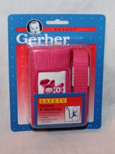 NEW IN PACKAGE 1994 VINTAGE BABY GERBER SAFETY HARNESS AND HANDSTRAP PINK - Picture 1 of 2