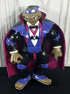 Vintage 1993 TMNT Universal Monsters Dracula Donatello Glow Actionfigur Playmates - Bild 1 von 6